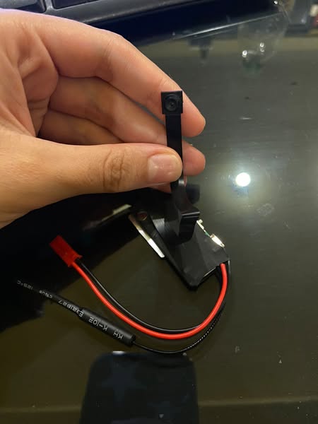 Mini Cámara Flex Larga Duración – 1080P HD + Transmisión en Viv